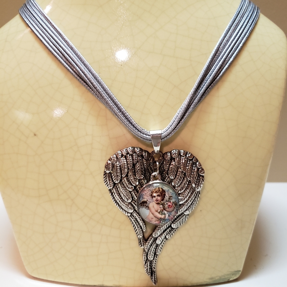 Angel themed necklace.